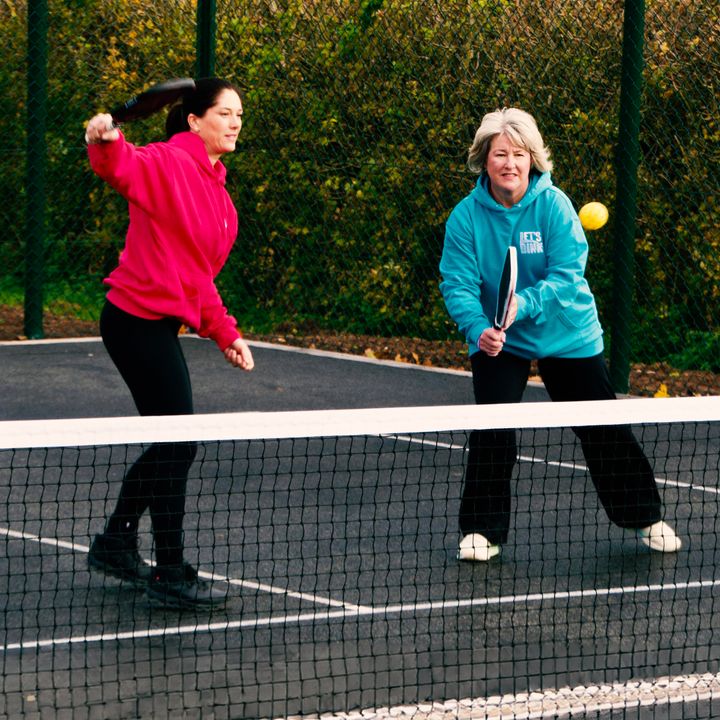 Woman playing pickleball